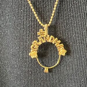 Avon Gold Tone Circular Pendant Necklace with two charm holders